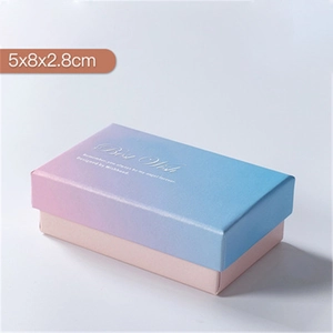 Detail of pink-blue gradient jewelry box with size 5x8x2.8cm on white background