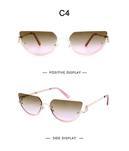 Detail of rose gold half-frame cat eye sunglasses with C-shaped hinge and gradient lenses