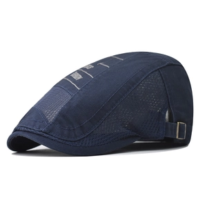 Detail of breathable navy mesh side and adjustable metal buckle on a canvas flat cap