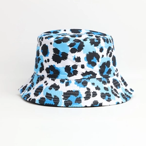 Stylish leopard print bucket hat in blue and black colors for outdoor sun protection