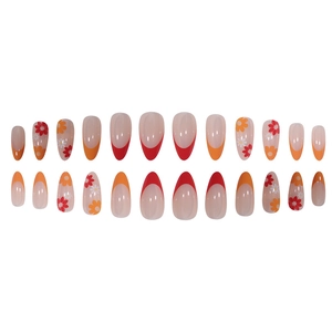 French style almond press-on nails with red, orange edges and white daisy patterns