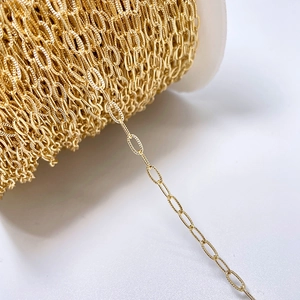 14k gold plated copper chain on white spool for jewelry making with 7x10mm O-ring links