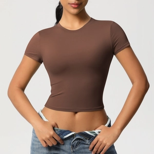 Close-up of slim fit brown crop top yoga shirt with professional high-elasticity fabric