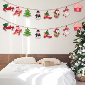 Christmas wooden banner hanging on wall with Santa, reindeer, and tree decor