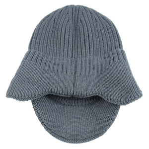 Detailed close-up showing the gray knitted texture and warm fleece lining of the winter beanie