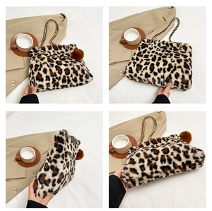 Detail view of leopard print plush bag featuring chain strap and pearl puff charm