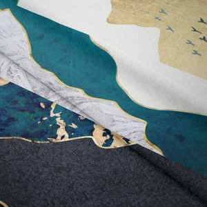 Detailed close-up of soft velvet tapestry with abstract green mountain and gold marble pattern