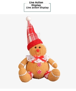 Close-up of a gingerbread man plush toy with corduroy texture and holiday details
