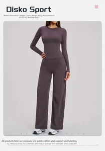 Detail of slim fit long sleeve top and high waist wide leg yoga pants in deep purple fabric