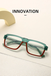 Detail of dual-tone rectangular glasses frame with premium metal hinge construction