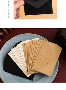 Macro detail of multi-color vintage kraft paper envelopes stacked in elegant arrangement