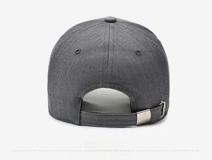 Detail view of the gray textured fabric and adjustable metal buckle on the baseball cap