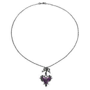 Detailed view of gothic silver necklace with purple heart pendant and black cross motif