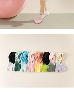 Detail view of tie-dye yoga five-toe socks with non-slip grip and cross elastic straps