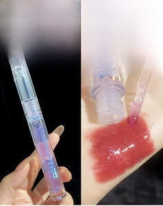 Macro shot of 03# Shimmer Lip Gloss with purple glitter on applicator and hand swatch