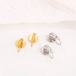 Minimalist gold and silver round titanium steel earring hoops with gemstone base