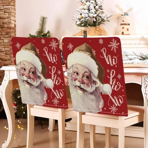 Set of two festive Christmas chair covers with Santa Claus and HO HO HO print detail