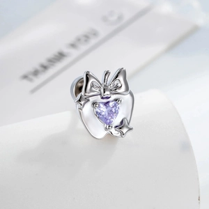 Orecchino a perno mela d'argento con fiocco e pietra di zircone a cuore viola