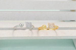 Gold and silver open rings with micro-pave zircon squares and smooth spherical beads