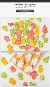Detail of diverse Christmas cookie cutters and shaped biscuits like Santa and reindeer
