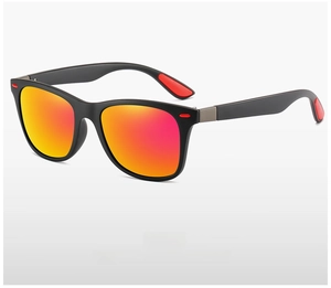 Detail of polarized sunglasses with matte black frame and orange-red gradient lenses