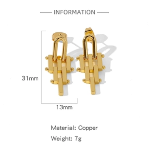 Detailed view of geometric gold earrings with dimensions 31mm by 13mm and copper material