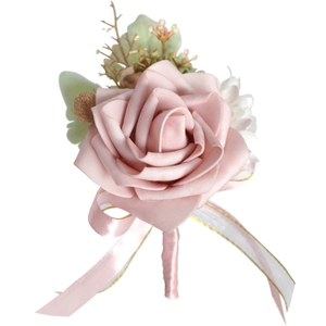 Pink PE rose wedding corsage with white accent flowers, green leaves and golden ribbon