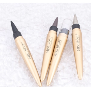 Macro view of four professional waterproof gel eyeliner pens on soft textured fabric