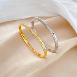 Minimalist full rhinestone stainless steel bangles in gold and silver on silk