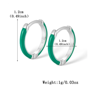 Detailed view of S925 sterling silver hoop earrings with bright green enamel and S925 hallmark