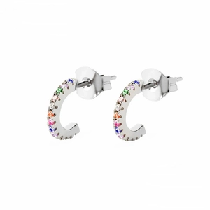 Macro shot of silver C-shaped hoop earrings featuring multi-color micro-pave cubic zirconia