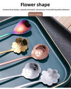 Detailed close-up of heart and flower-shaped gold stainless steel spoons on tray