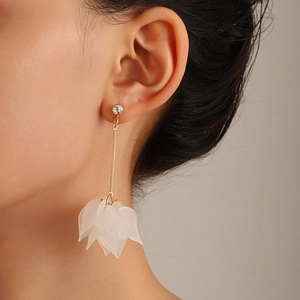 Elegant long petal tassel earrings with gold link and translucent white floral cluster