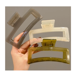 Three 13cm oversized acrylic hair claws in smoke grey, cream, and olive green colors