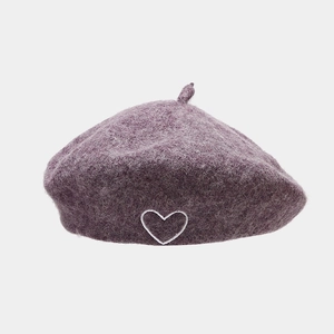 Detail of wool beret showing soft purple texture and white heart embroidery