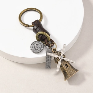 Vintage bronze anchor keychain with leather wrap, windmill charm, and engraved plate