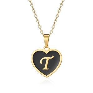 Detail of heart pendant with black enamel finish and gold letter T on a cable chain
