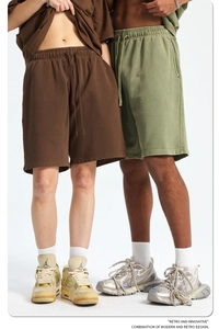 Detail of drawstring waistbands on vintage olive and brown heavy cotton sweat shorts