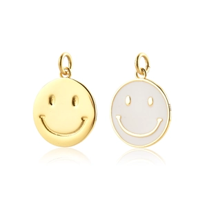 Detail of S925 silver smiley face pendants in gold and white enamel with mirror reflection