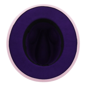 Detailed top view of two-tone wool felt fedora showing pink exterior and purple interior