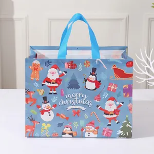 Blue non-woven Christmas gift bag with Santa Claus, Snowman and Merry Christmas prints