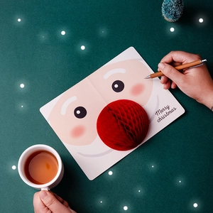 3D Pop-up Christmas card with red honeycomb ball nose and Merry Christmas greetings