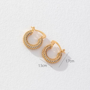 Detailed macro view showing the 1.5cm width and 1.7cm diameter of gold zircon hoop earrings