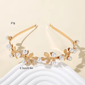 Detail of bohemian gold leaf headband with pearls showing 2.3cm height and 21g weight