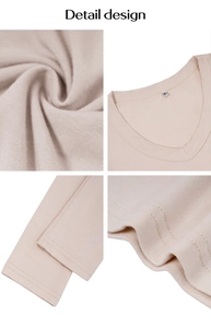 Dettaglio del tessuto a costine e scollo a V di una maglia a maniche lunghe color beige