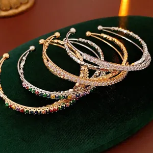 Luxurious crisscross open bangles with colorful zircon in gold and silver finish