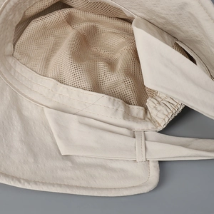 Detail of the sun hat showing breathable honeycomb mesh lining and adjustable drawstring