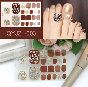 Waterproof gold glitter toe nail wraps in earth tones with metallic foil textures