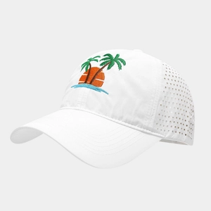 Detail of laser-cut ventilation holes and palm tree embroidery on a white quick-dry cap