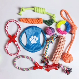 Detailed set of colorful cotton rope and rubber dog toys for aggressive chewers